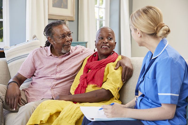A healthcare worker discusses skilled nursing care with a couple in Bossier City