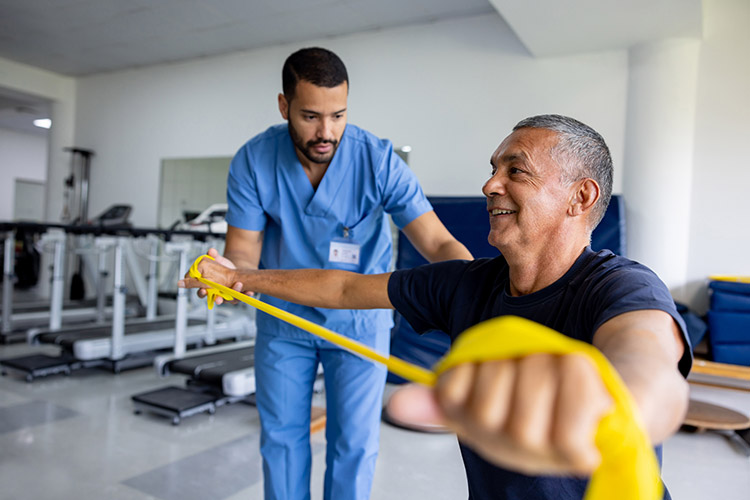 A senior man undergoes physical therapy in a skilled nursing facility in Bossier City