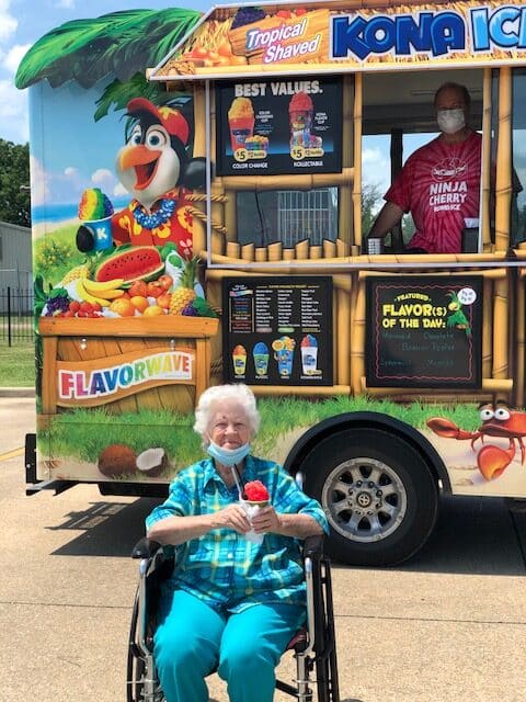 Resident enjoying ice cream outside at Pilgrim Manor