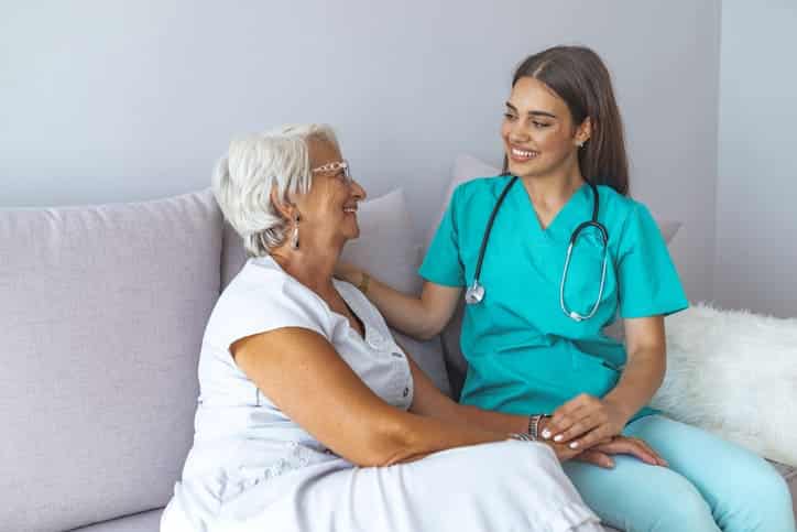 Nurse consoling a patient